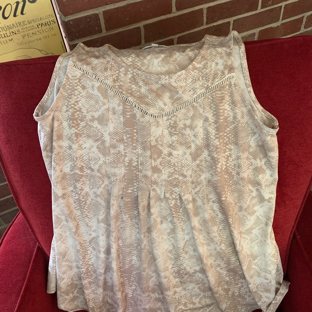 New Directions cool and airy top has sweet gathers at yoke with eyelet trim.